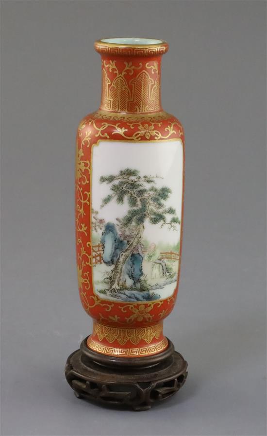 A Chinese coral ground famille rose cylindrical vase, Qianlong mark, Republic period, H. 15cm excluding wood stand
